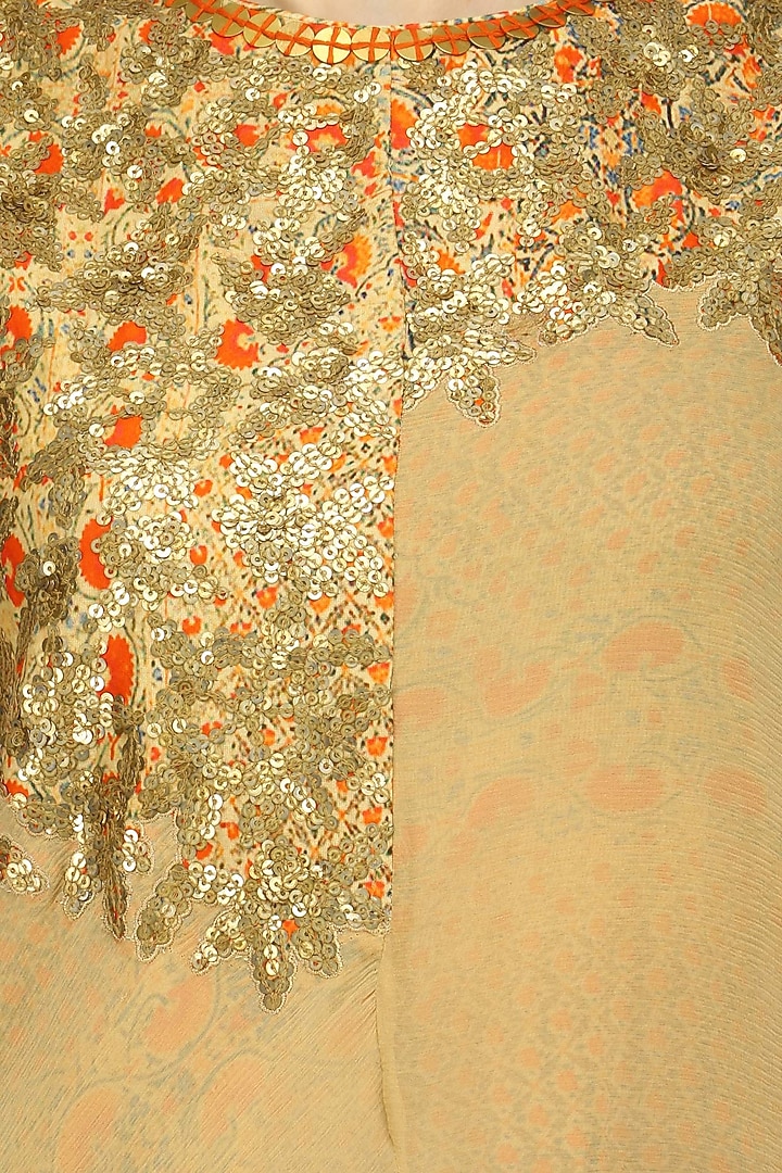 Beige high low orange print tier kurta and churidaar set available only at Pernia's Pop Up Shop.