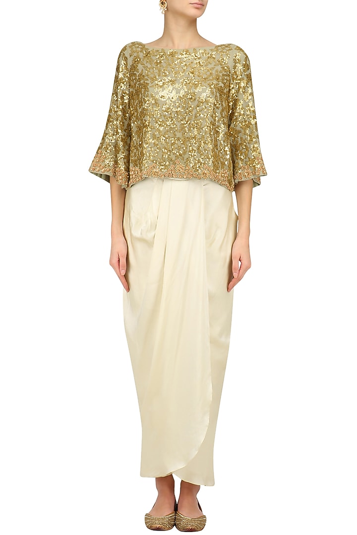 Golden sequins embroidered kaftan top and ivory dhoti skirt set available only at Pernia's Pop Up Shop.