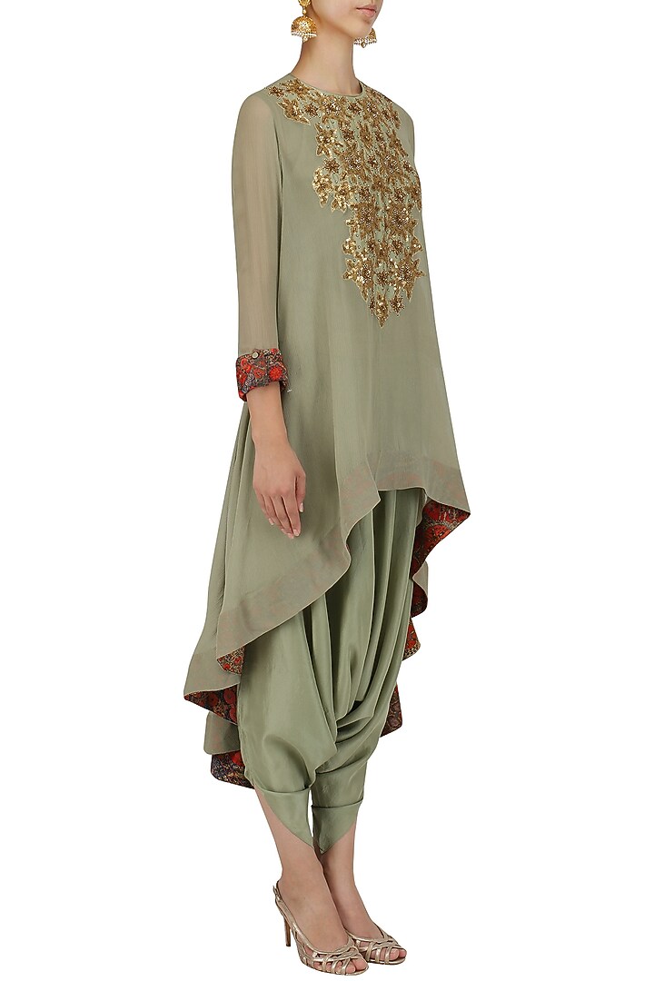 Pale blue sequins embroidered tunic and dhoti pants set available only at Pernia's Pop Up Shop.