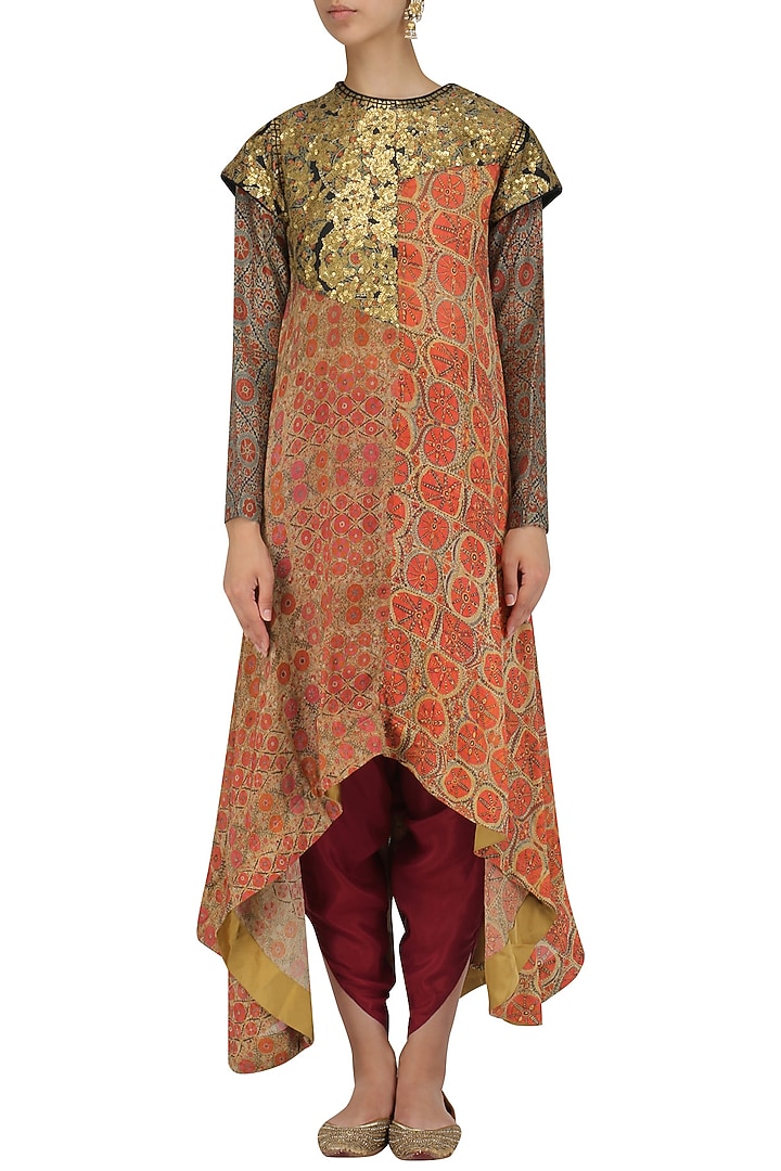 Orange sequinned tunic and dhoti pants set available only at Pernia's Pop Up Shop.