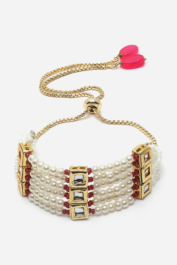 Gold Finish Kundan Polki & Pearl Bracelet by Dugran By Dugristyle at Pernia's Pop Up Shop