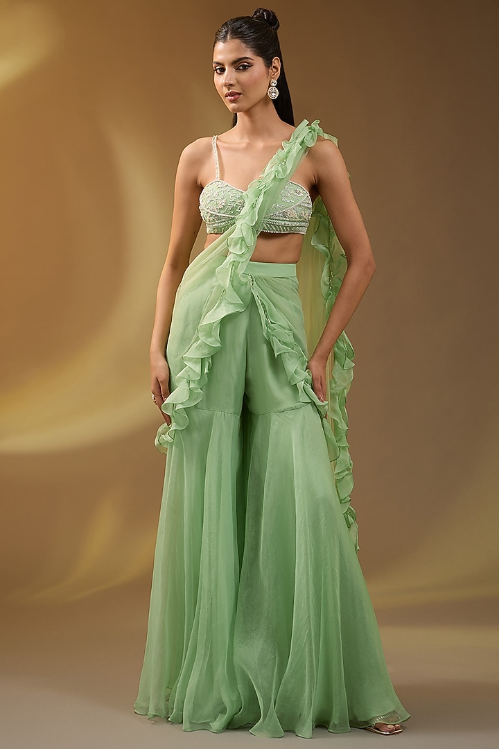 Green Net Hand & Machine Embroidered Sharara Jacket Reception Saree Set by Devika Bhayana at Pernia's Pop Up Shop
