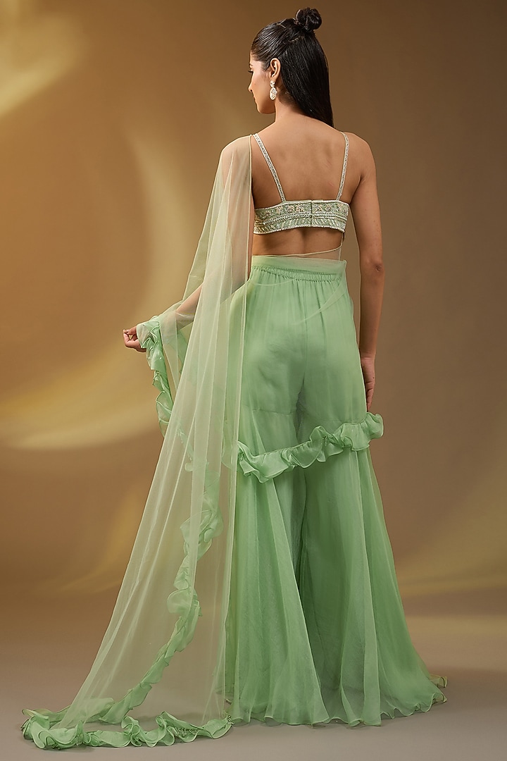 Green Net Hand & Machine Embroidered Sharara Jacket Reception Saree Set by Devika Bhayana at Pernia's Pop Up Shop