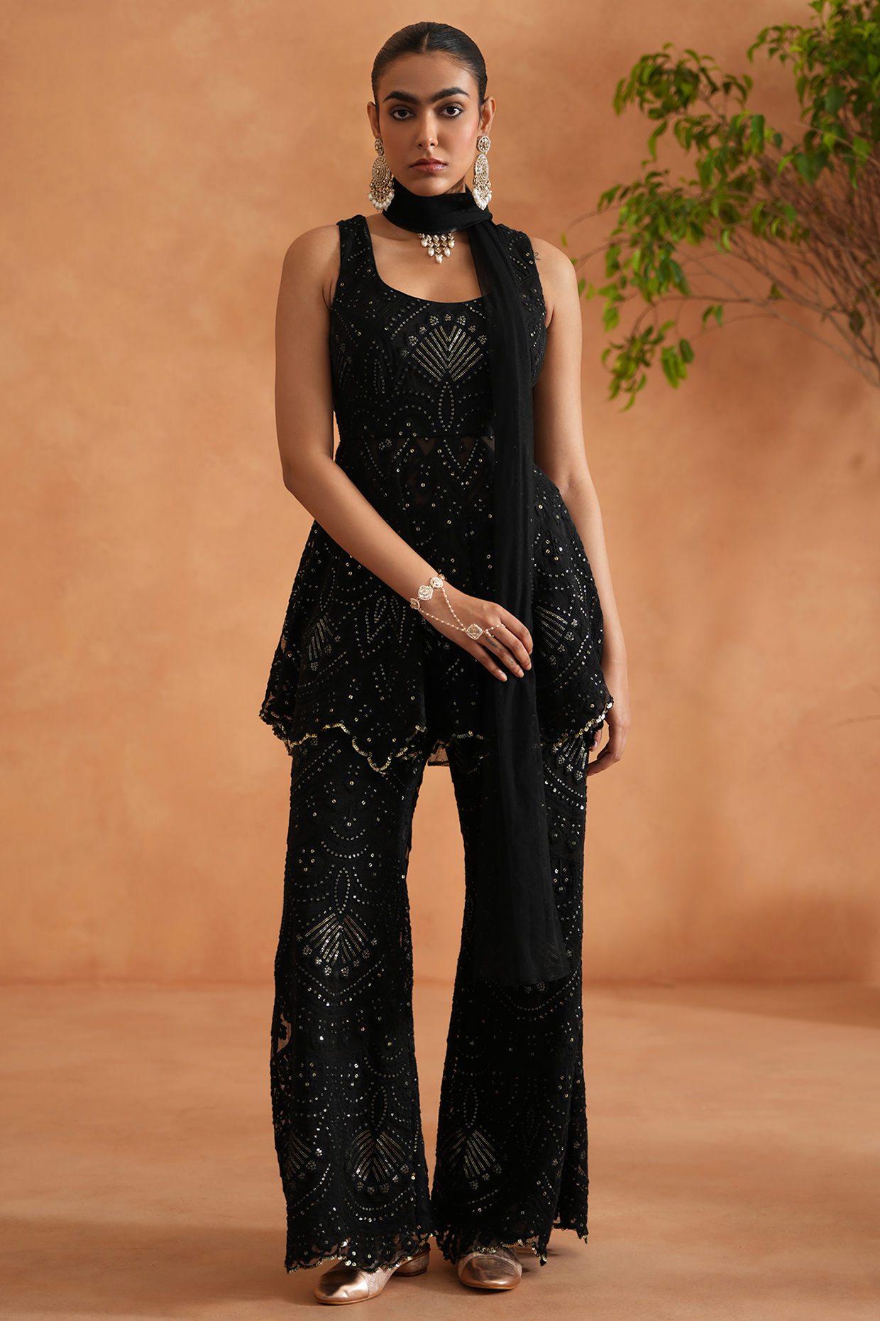 Black Net Embroidered Peplum Kurta Set by Deepika Chadha at Pernia's Pop Up Shop