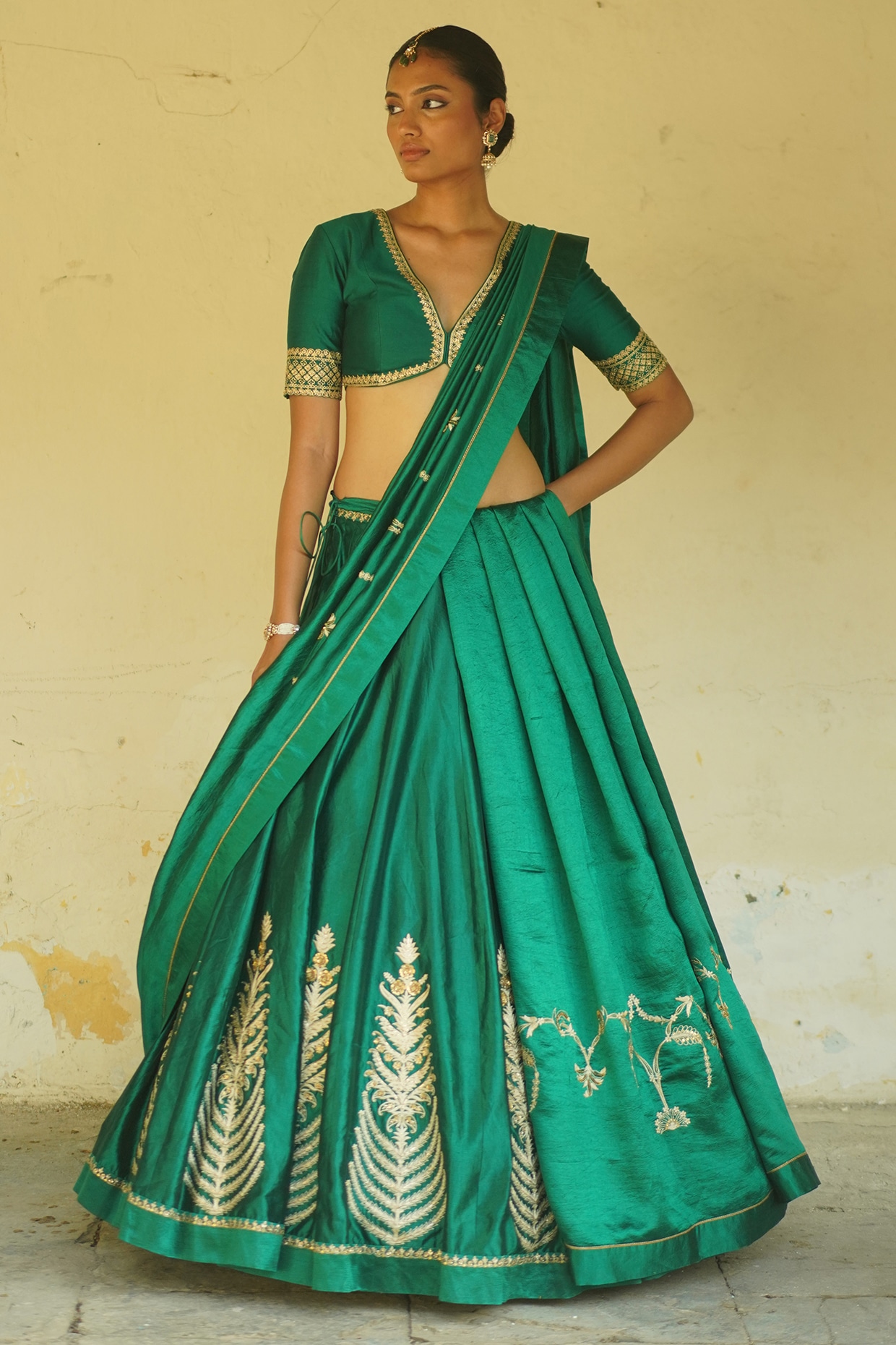 Deep thee Emerald Green Silk Hand Embroidered Lehenga Set