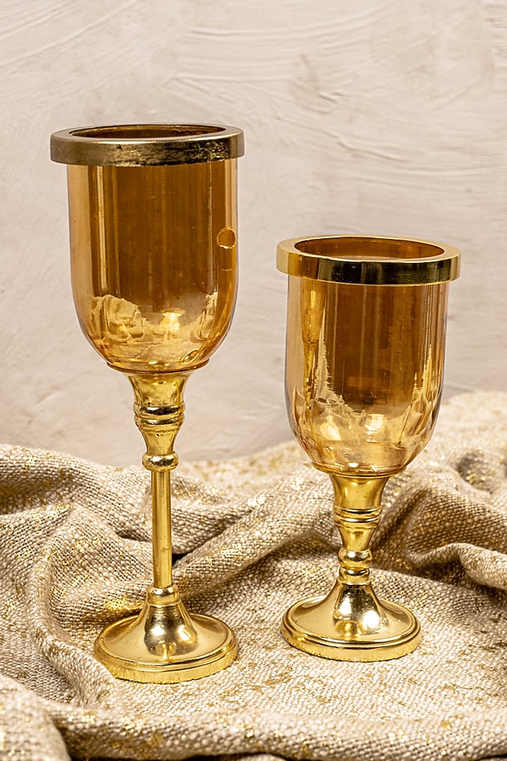 Gold Glass & Metal Hurricane Candle Holder (Set of 2) by The 7 Dekor at Pernia's Pop Up Shop