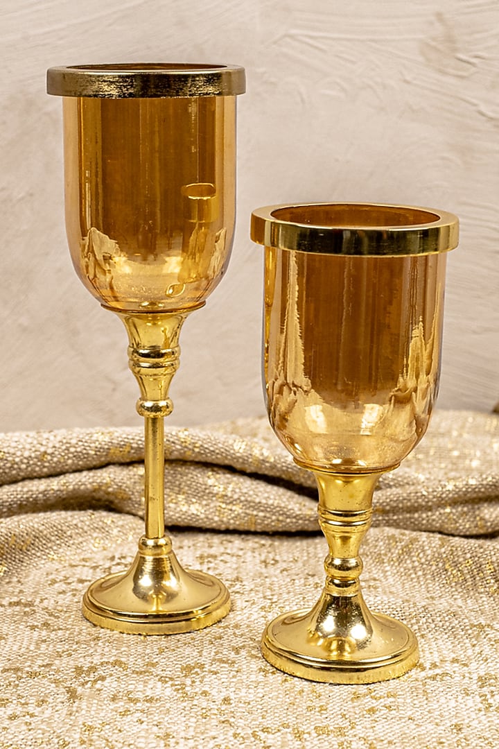 Gold Glass & Metal Hurricane Candle Holder (Set of 2) by The 7 Dekor at Pernia's Pop Up Shop