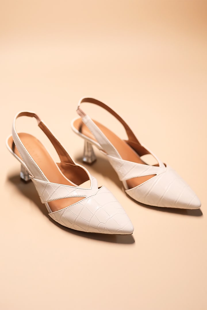 White Faux Leather Slingback Pumps by Devano at Pernia's Pop Up Shop