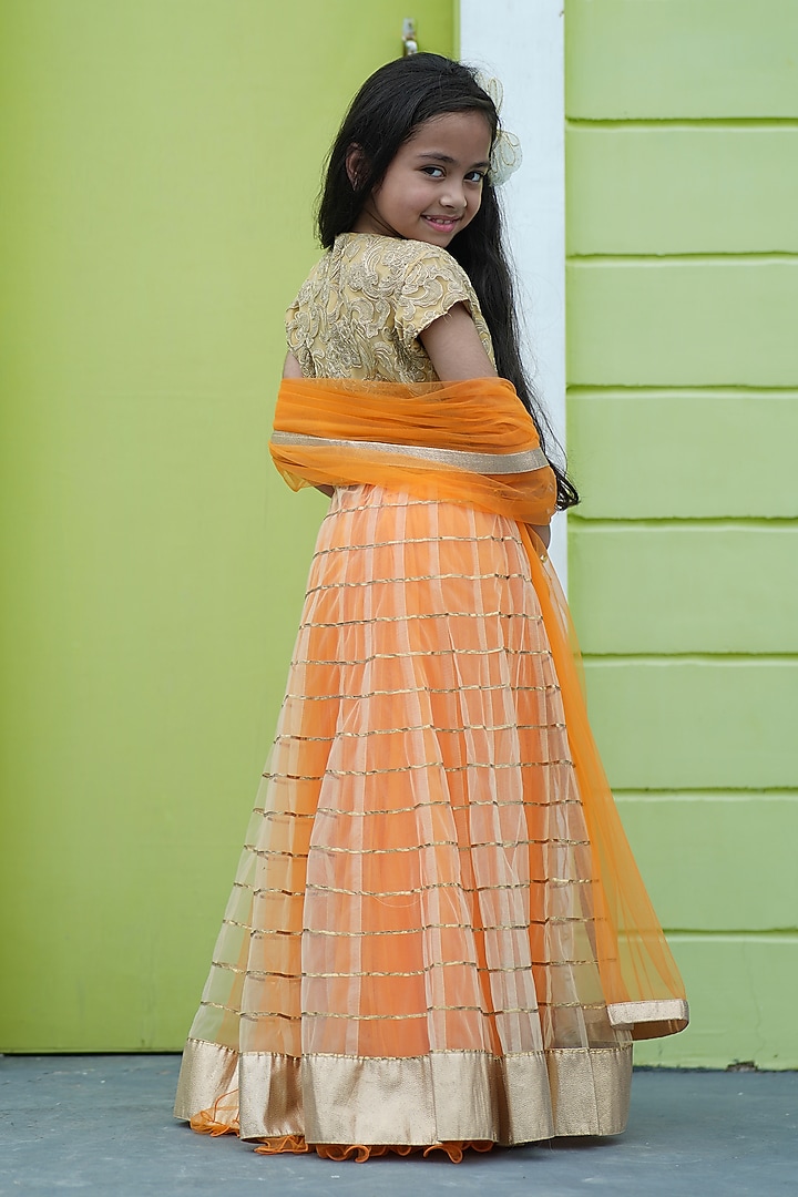 Orange Heavy Brocade & Net Lehenga Set For Girls by Devils N Angles at Pernia's Pop Up Shop