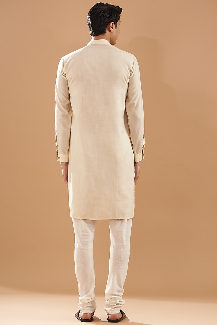 Beige Matka Silk Motif Thread Embroidered Asymmetric Kurta Set by Dev Kumar at Pernia's Pop Up Shop