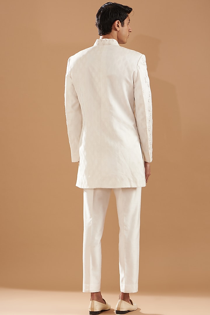 Ivory Satin Silk Embroidered Wedding Sherwani Set by Dev Kumar at Pernia's Pop Up Shop