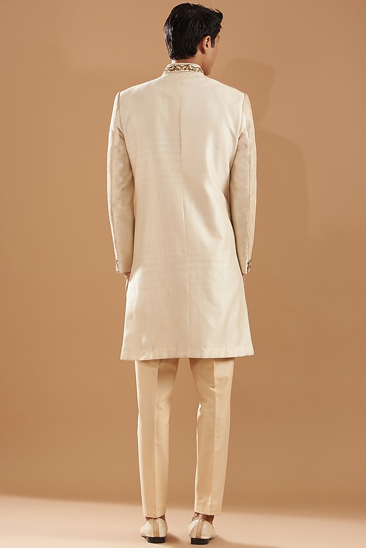 Beige Raw Silk Embroidered Wedding Indowestern Set by Dev Kumar at Pernia's Pop Up Shop