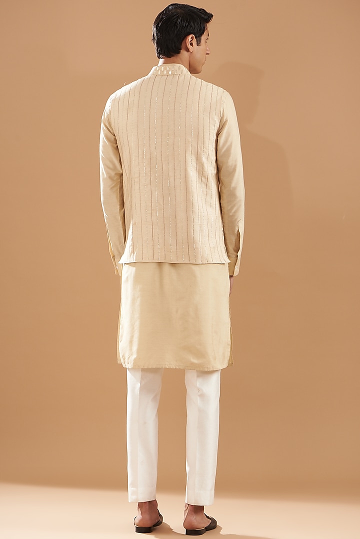 Beige Raw Silk Foil Work Bundi Jacket Set by Dev Kumar at Pernia's Pop Up Shop