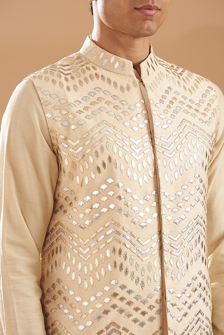 Beige Raw Silk Foil Work Bundi Jacket Set by Dev Kumar at Pernia's Pop Up Shop