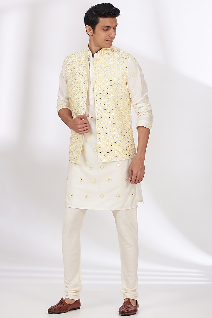 Ivory Raw Silk Embroidered Bundi Set by Dev Kumar