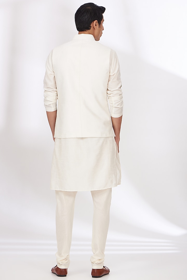 Ivory Raw Silk Embroidered Bundi Set by Dev Kumar at Pernia's Pop Up Shop