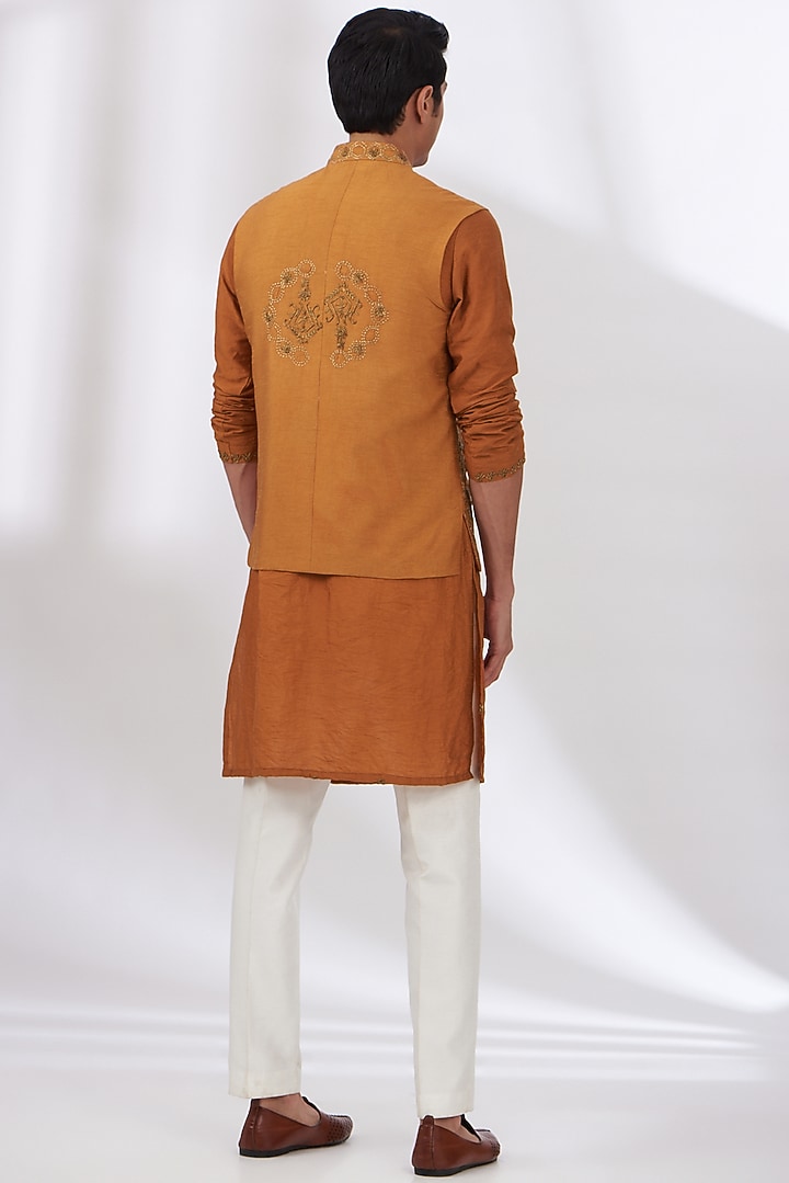 Rust Orange Raw Silk Hand Embroidered Bundi Set by Dev Kumar at Pernia's Pop Up Shop