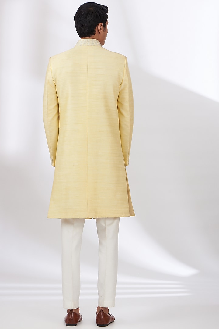 Light Yellow Raw Silk Embroidered Wedding Sherwani Set by Dev Kumar at Pernia's Pop Up Shop
