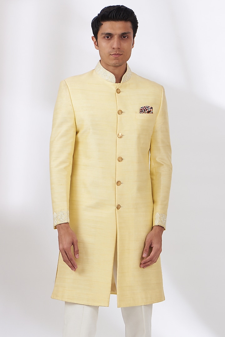 Light Yellow Raw Silk Embroidered Wedding Sherwani Set by Dev Kumar at Pernia's Pop Up Shop