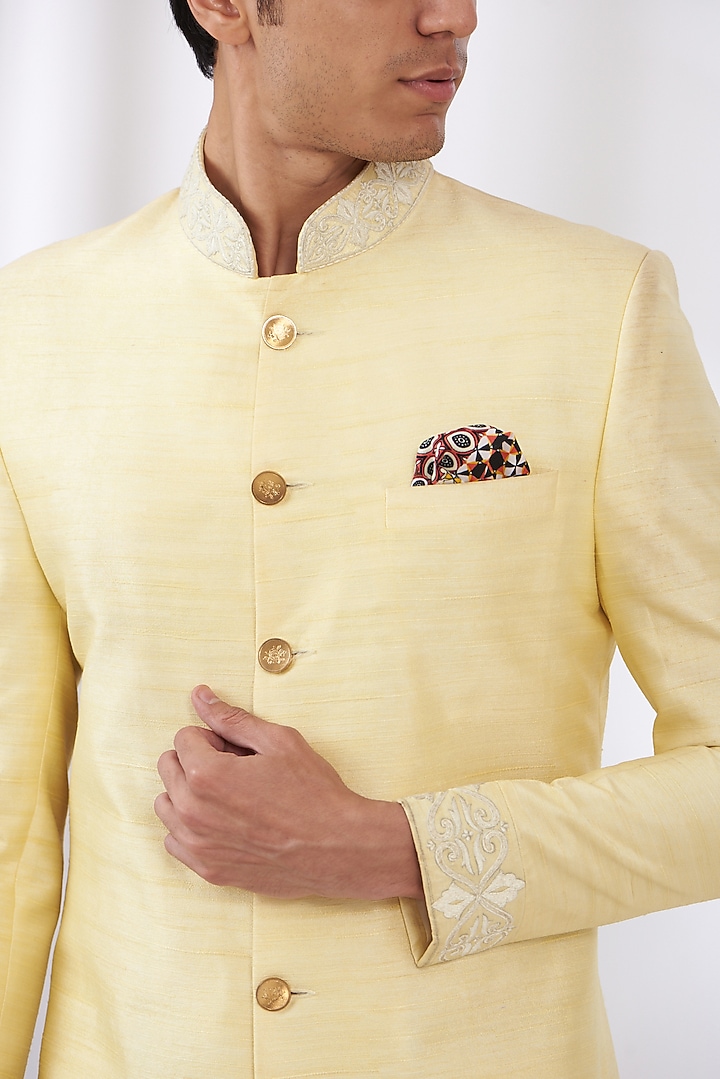Light Yellow Raw Silk Embroidered Wedding Sherwani Set by Dev Kumar at Pernia's Pop Up Shop