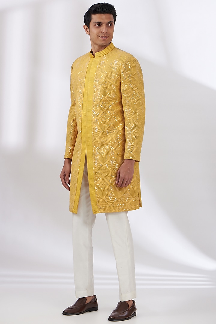 Yellow Raw Silk Embroidered Sherwani Set by Dev Kumar