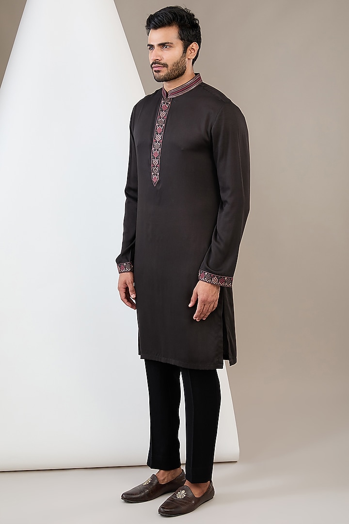 Black Raw Silk Machine Embroidered Bundi Jacket Set by Dev Kumar at Pernia's Pop Up Shop