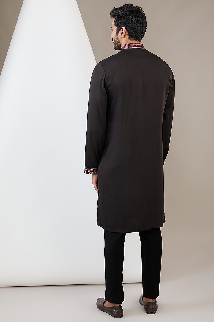Black Raw Silk Machine Embroidered Bundi Jacket Set by Dev Kumar at Pernia's Pop Up Shop