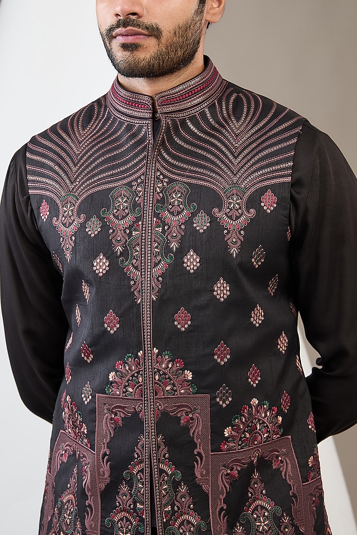 Black Raw Silk Machine Embroidered Bundi Jacket Set by Dev Kumar at Pernia's Pop Up Shop