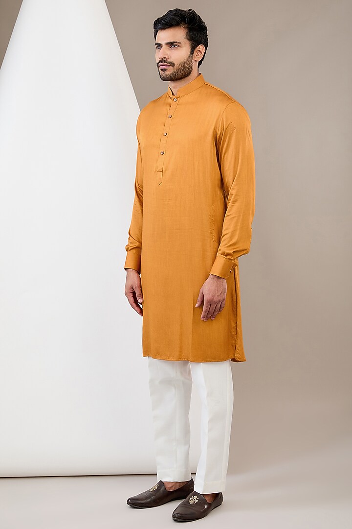 Mustard Raw Silk Motif Embroidered Bundi Jacket Set by Dev Kumar at Pernia's Pop Up Shop