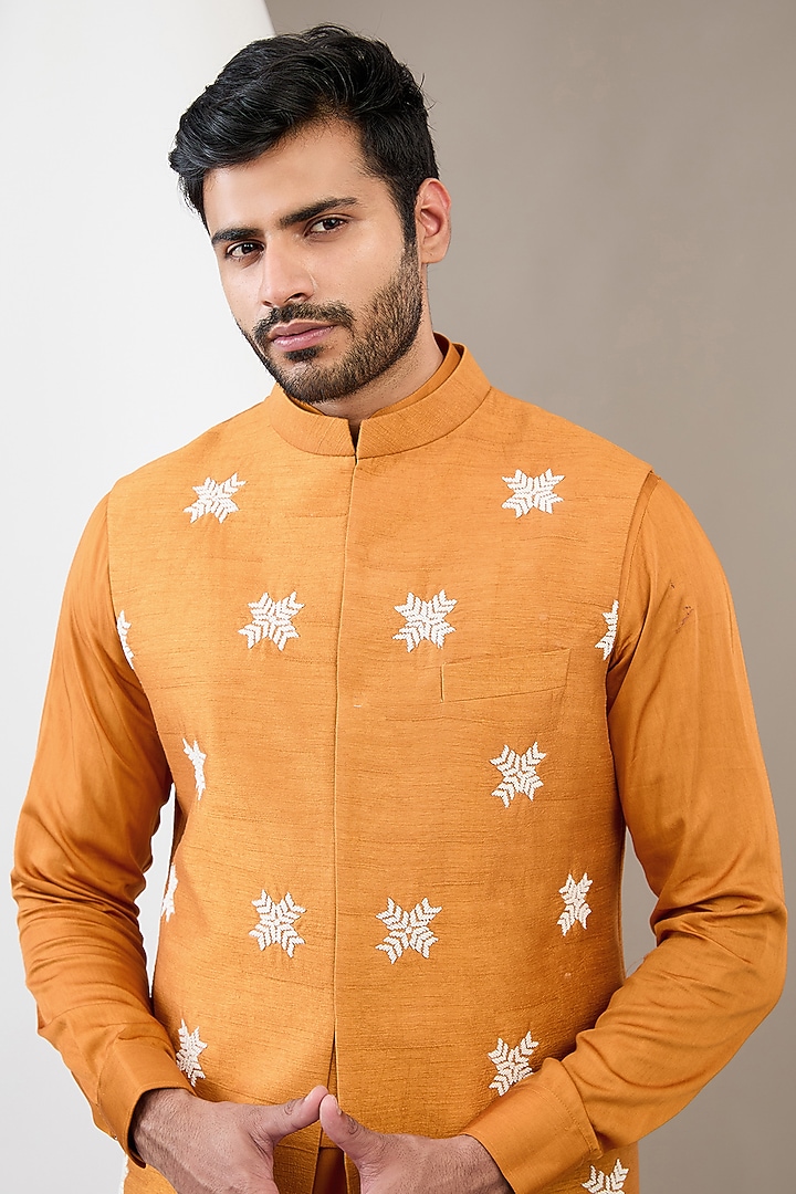 Mustard Raw Silk Motif Embroidered Bundi Jacket Set by Dev Kumar at Pernia's Pop Up Shop