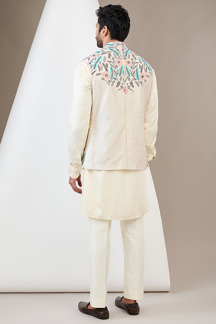 Ivory Raw Silk Resham & Dabka Embroidered Bundi Jacket Set by Dev Kumar at Pernia's Pop Up Shop