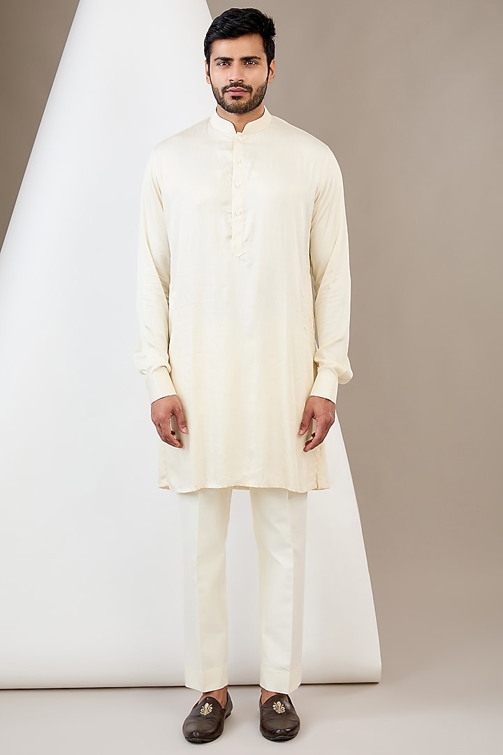 Ivory Raw Silk Resham & Dabka Embroidered Bundi Jacket Set by Dev Kumar at Pernia's Pop Up Shop