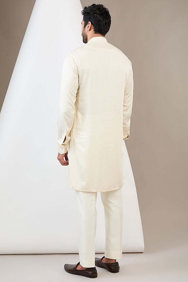 Ivory Raw Silk Resham & Dabka Embroidered Bundi Jacket Set by Dev Kumar at Pernia's Pop Up Shop