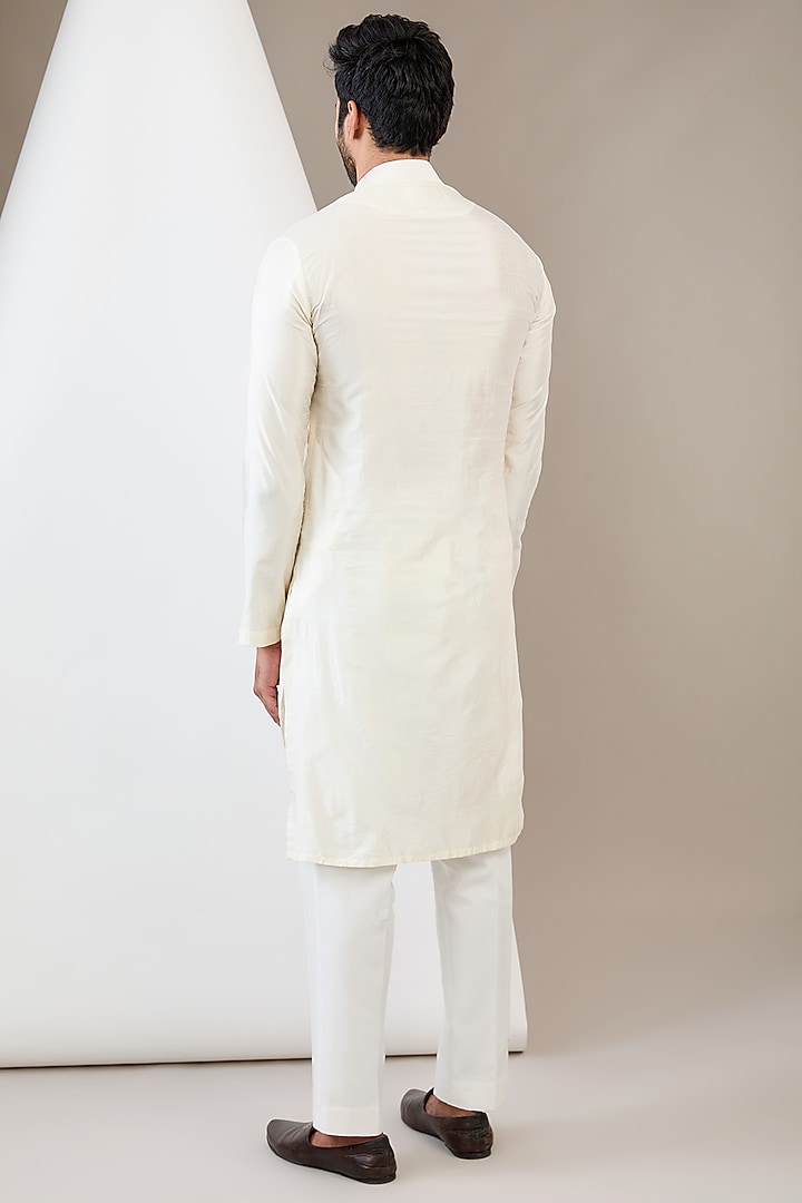 White Raw Silk Hand Embroidered Bundi Jacket Set by Dev Kumar at Pernia's Pop Up Shop