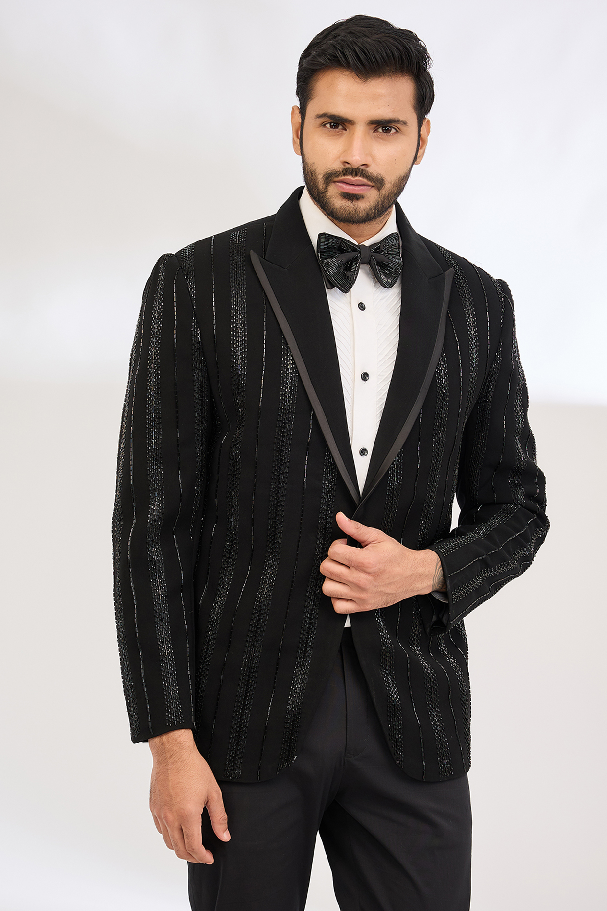 Black Italian Crepe Bead Hand Embroidered Tuxedo Set by Dev Kumar at Pernia's Pop Up Shop