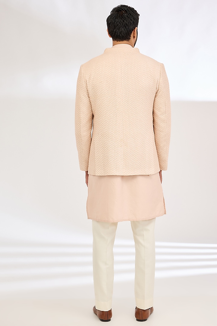Peach Raw Silk Sequin Hand Embroidered Wedding Indowestern Set by Dev Kumar at Pernia's Pop Up Shop