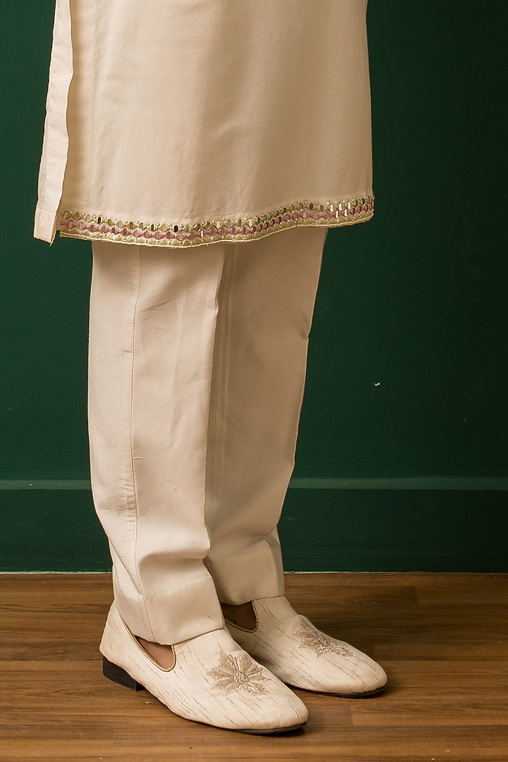 Ivory Raw Silk Resham Embroidered Nehru Jacket Set by Dev Kumar at Pernia's Pop Up Shop