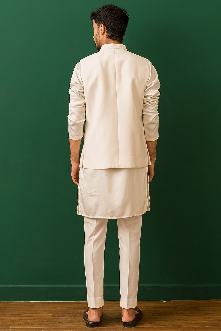 Ivory Italian Crepe Resham Embroidered Bundi Jacket Set by Dev Kumar at Pernia's Pop Up Shop