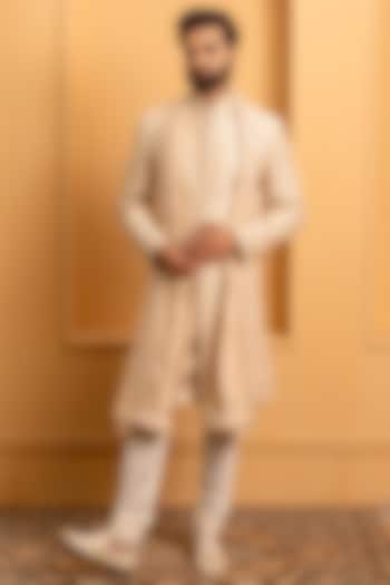 Beige Raw Silk Hand Embroidered Groom Sherwani Set by Dev Kumar at Pernia's Pop Up Shop