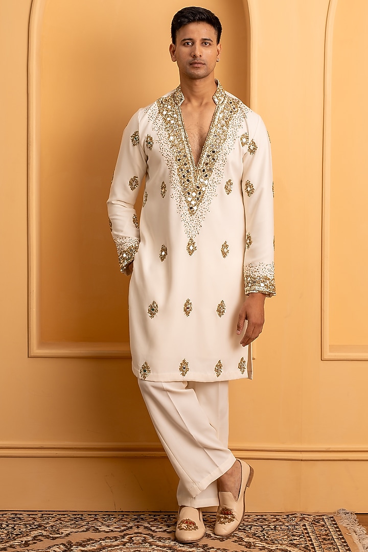 Ivory Sequins Embroidered Kurta Set by Dev Kumar at Pernia's Pop Up Shop