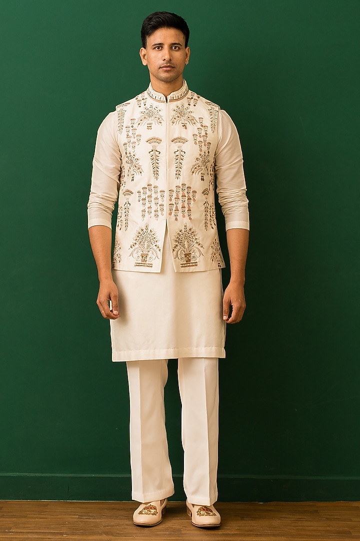 Ivory Raw Silk Resham Embroidered Bundi Jacket Set by Dev Kumar at Pernia's Pop Up Shop