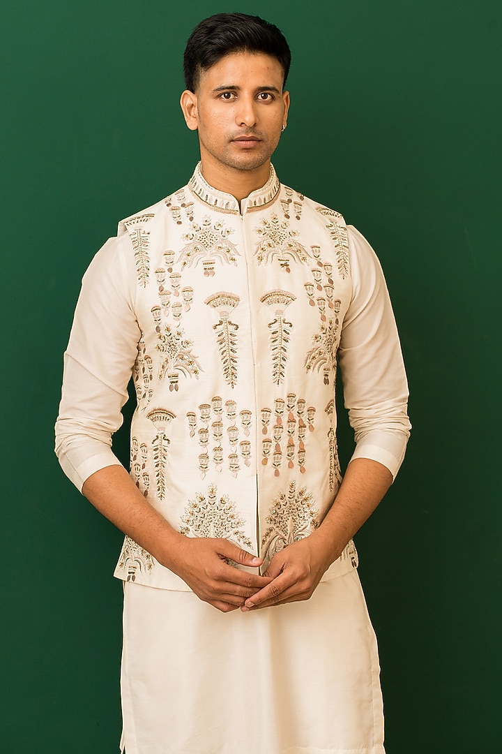 Ivory Raw Silk Resham Embroidered Bundi Jacket Set by Dev Kumar at Pernia's Pop Up Shop