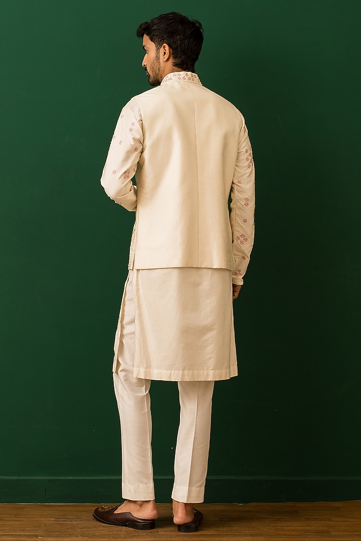 Ivory Italian Crepe Hand Embroidered Bundi Jacket Set by Dev Kumar at Pernia's Pop Up Shop