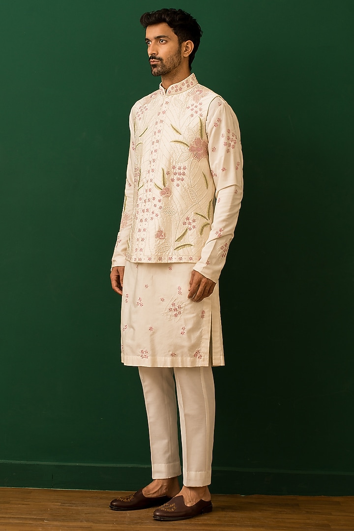 Ivory Italian Crepe Hand Embroidered Bundi Jacket Set by Dev Kumar at Pernia's Pop Up Shop