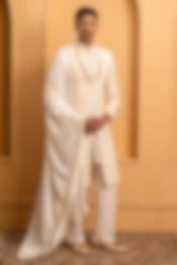 Ivory Raw Silk Handwork Groom Sherwani Set Set by Dev Kumar at Pernia's Pop Up Shop