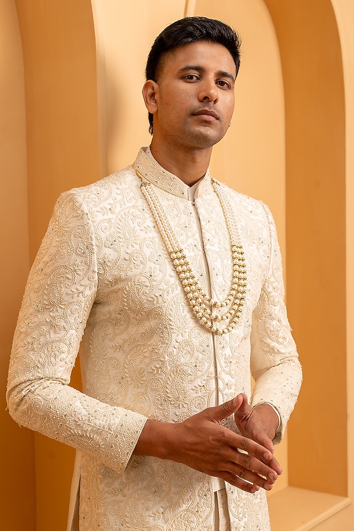 Ivory Raw Silk Handwork Groom Sherwani Set Set by Dev Kumar at Pernia's Pop Up Shop