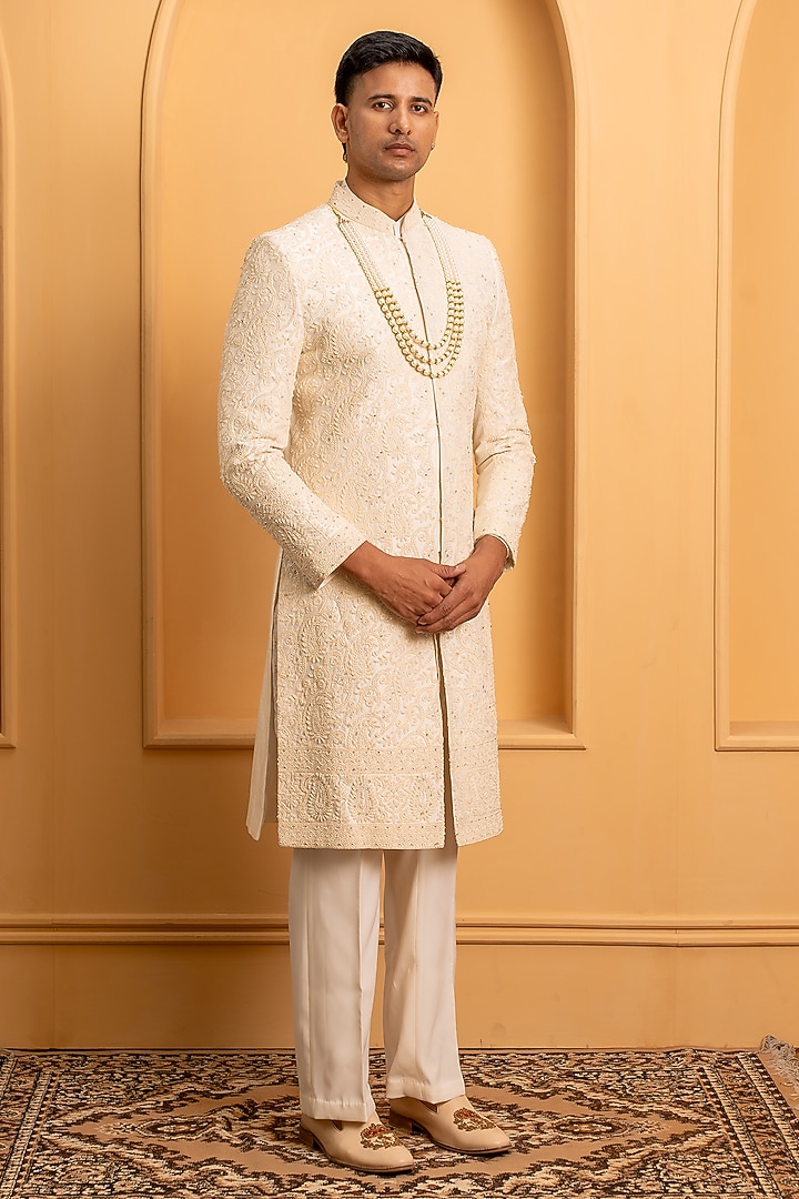 Ivory Raw Silk Handwork Groom Sherwani Set Set by Dev Kumar at Pernia's Pop Up Shop