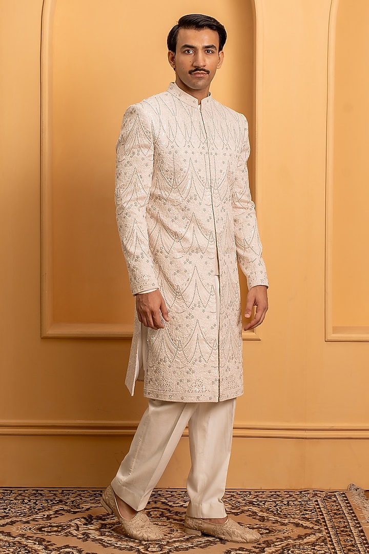 Baby Pink Raw Silk Handwork Groom Sherwani Set by Dev Kumar at Pernia's Pop Up Shop