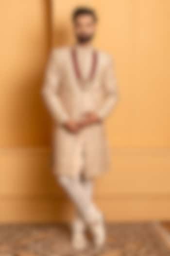 Rose Gold Raw Silk Resham Handwork Groom Sherwani Set by Dev Kumar at Pernia's Pop Up Shop