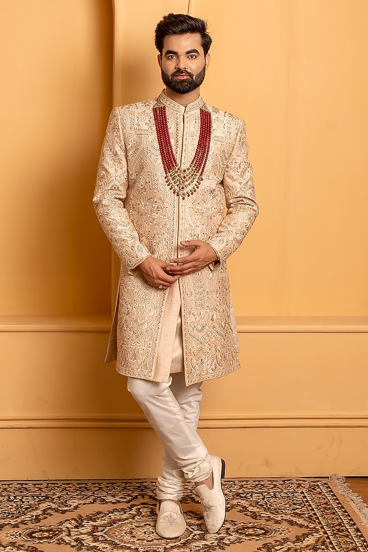 Rose Gold Raw Silk Resham Handwork Groom Sherwani Set by Dev Kumar at Pernia's Pop Up Shop
